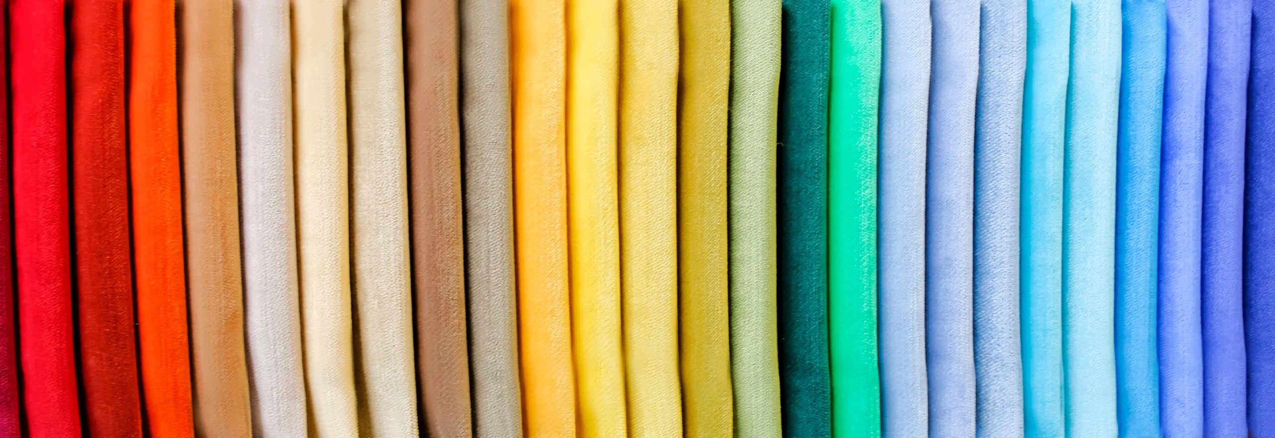 Pile of rainbow folded clothes